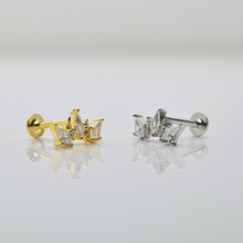 SK STUDIO MONARCH STUD available in silver and gold. ear piercing locations for this unique stud is versatile. you can wear this ear stud in lobe, helix, conch and flat