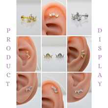 SK STUDIO MONARCH STUD available in silver and gold. ear piercing locations for this unique stud is versatile. you can wear this ear stud in lobe, helix, conch and flat